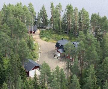 Фото номера Дом для отпуска с 4 спальнями Дома для отпуска Holiday Home Tuomarniemi г. Коконваара 59