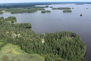 Фото номера Дом для отпуска с 4 спальнями Дома для отпуска Holiday Home Tuomarniemi г. Коконваара 60