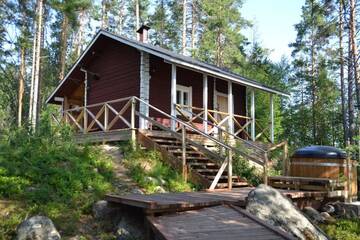 Фото номера Дом для отпуска с 4 спальнями Дома для отпуска Holiday Home Tuomarniemi г. Коконваара 88