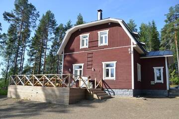 Фото номера Дом для отпуска с 4 спальнями Дома для отпуска Holiday Home Tuomarniemi г. Коконваара 94